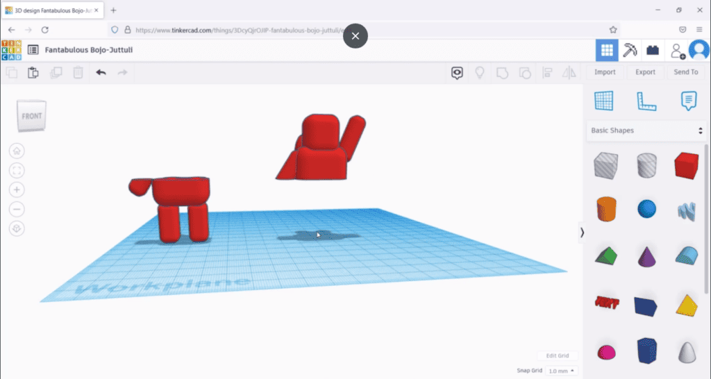Tinkercad screen showing a red figurine model with its torso and head separated from the legs on the workplane.