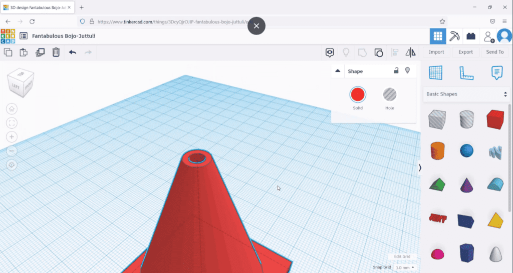 A screenshot of a 3D design on Tinkercad showing a close-up of a red hollow cone shape with a view from the top down.