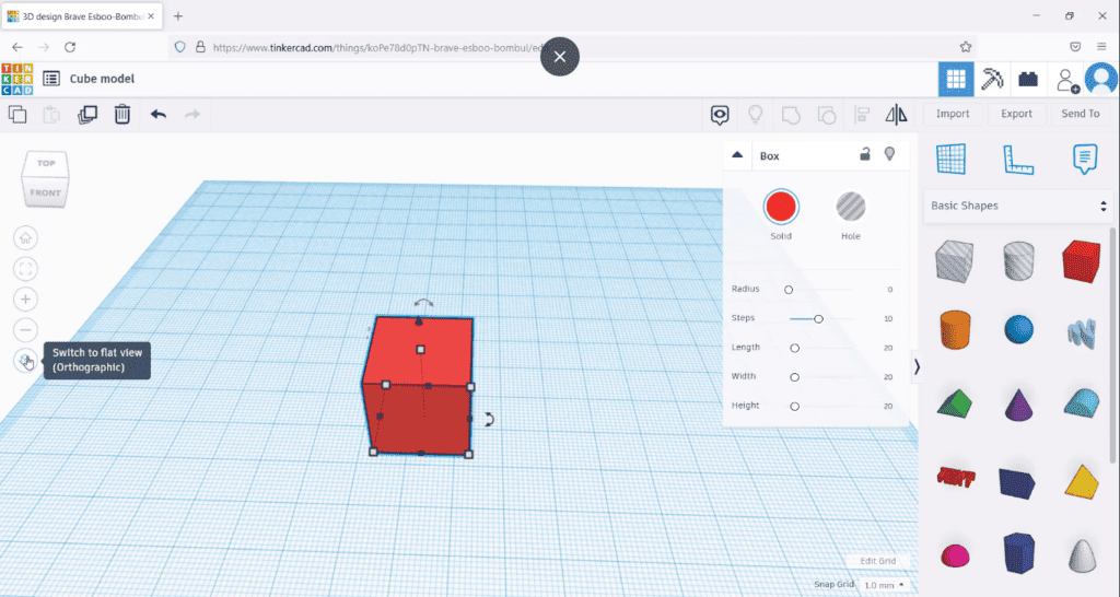 A screenshot of the Tinkercad 3D design interface with a selected red cube on the workplane and the properties panel open for the box shape.