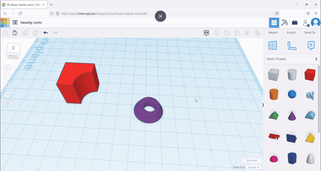 A screenshot of a 3D modeling program displaying a red pentagonal prism and a separate purple torus on a grid workspace.